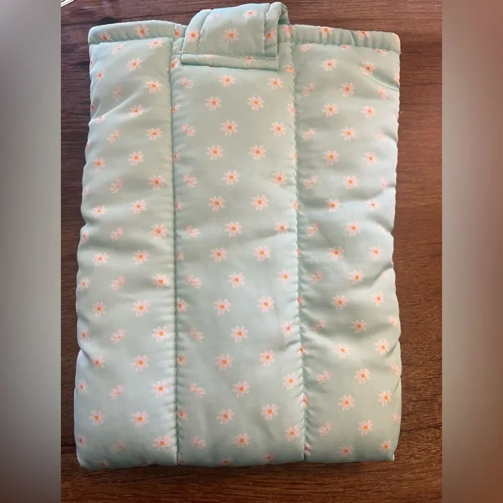 Light Blue Quilted Book Sleeve with Orange Text